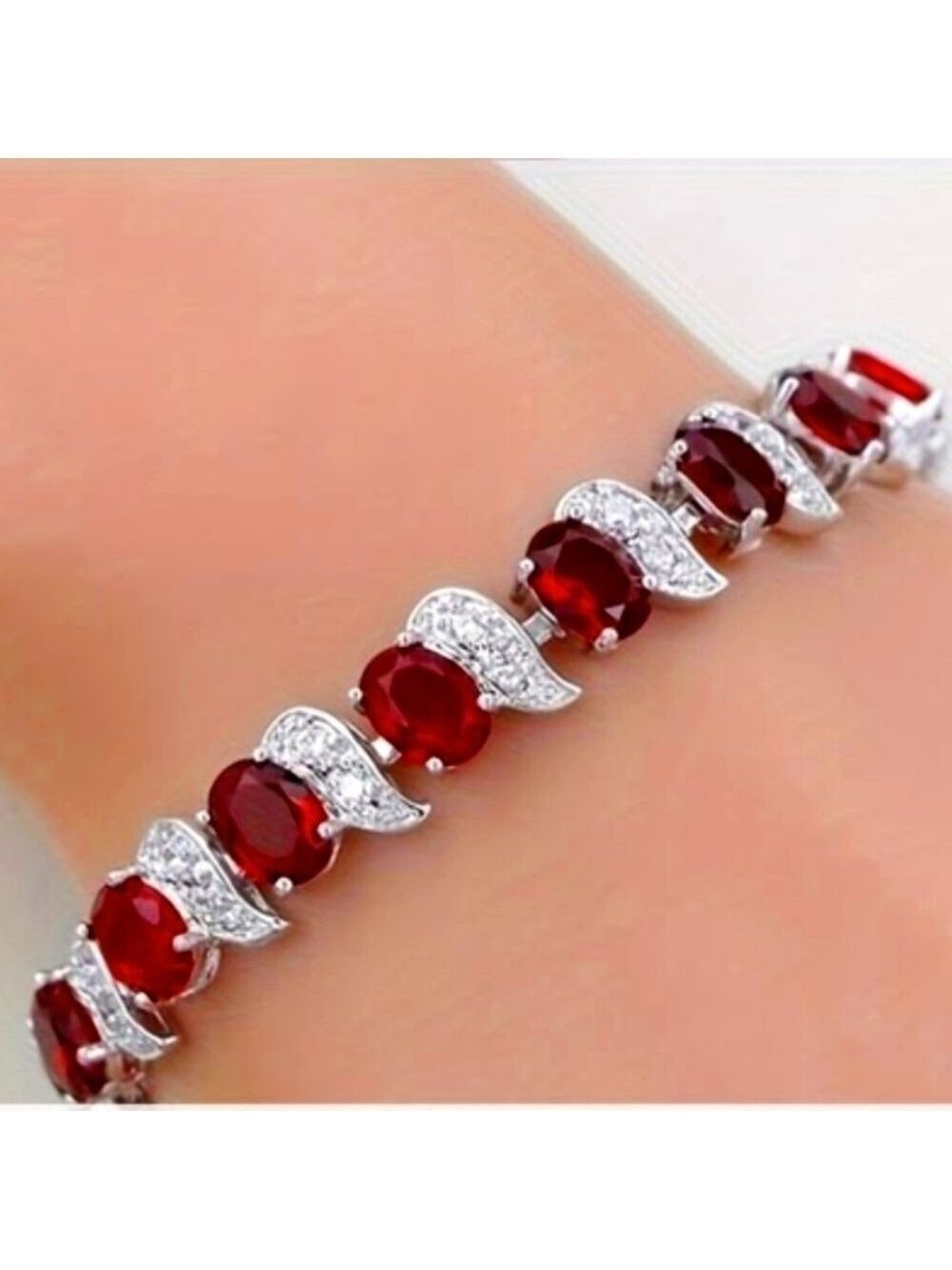 Zircon tennis bracelet,red zircon stones and silver plated extra length 8.25".